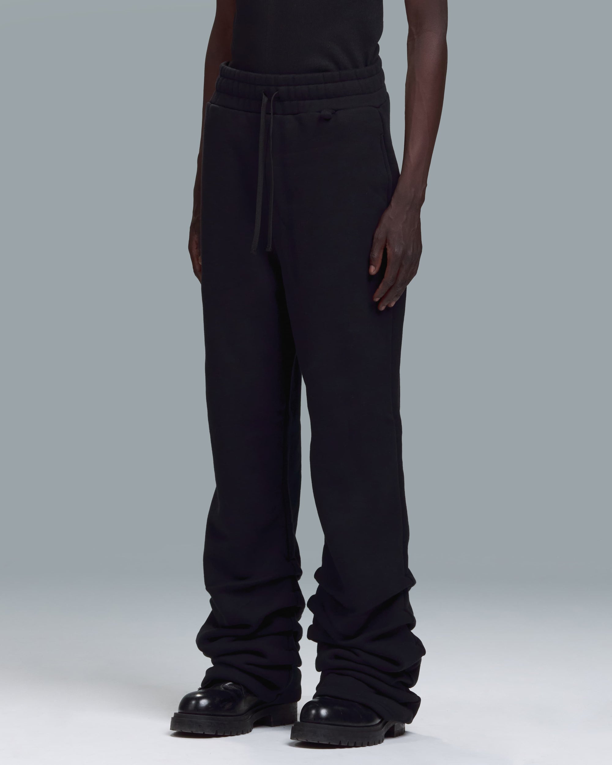 HIGH RISK STACKED SWEATPANTS - BLACK