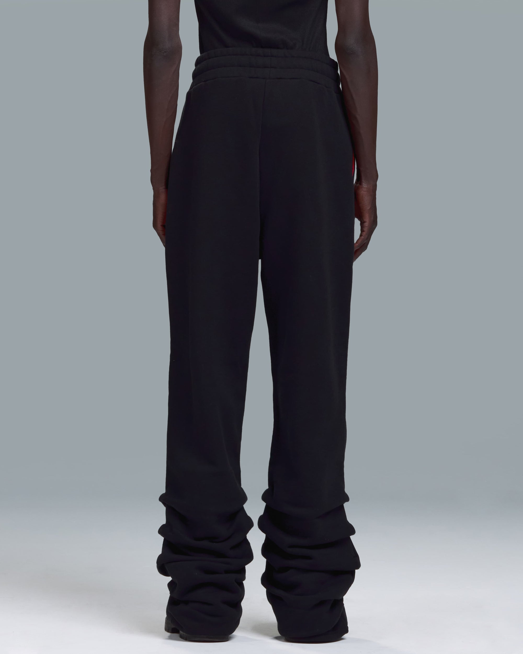 HIGH RISK STACKED SWEATPANTS - BLACK