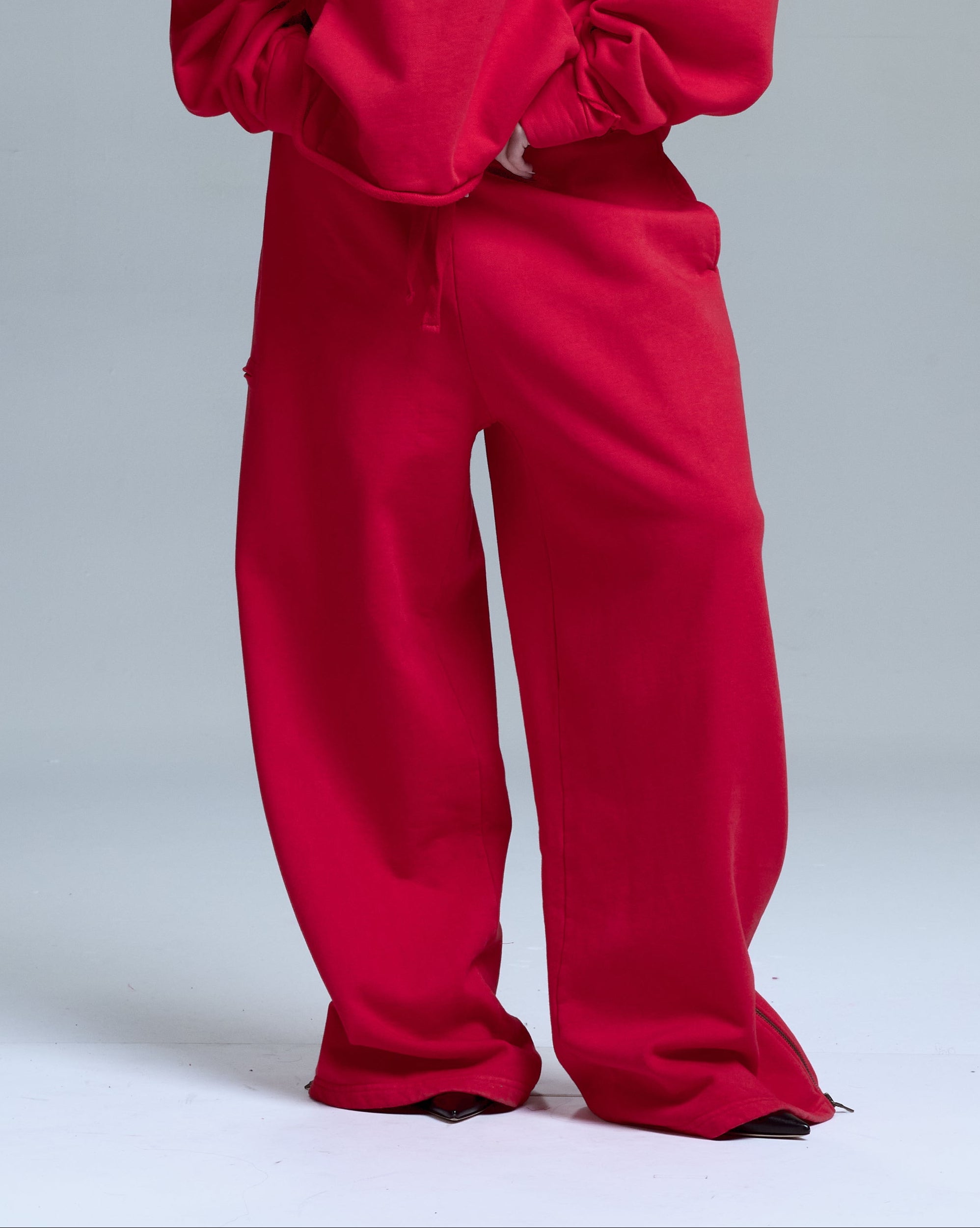 HIGH RISK ZIPPER SWEATPANTS - RED