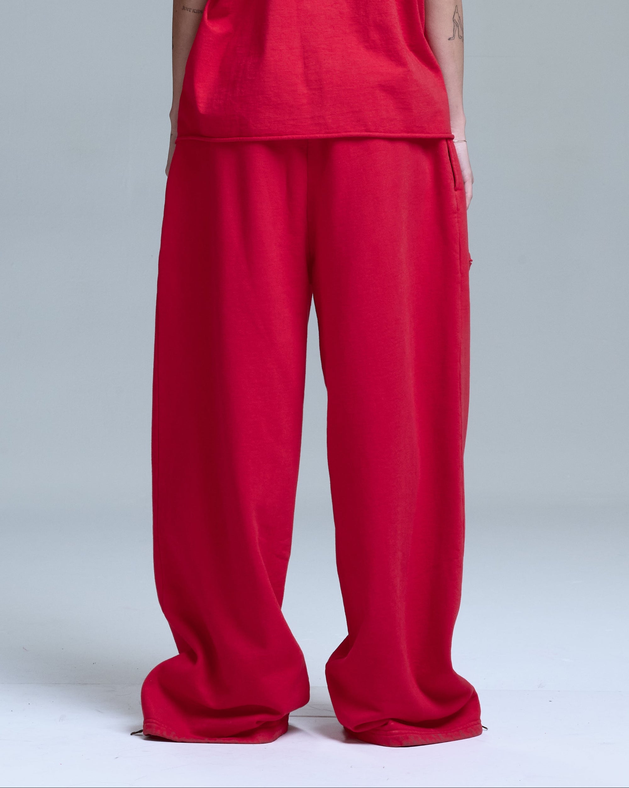 HIGH RISK ZIPPER SWEATPANTS - RED