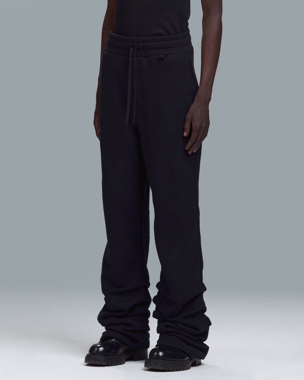 HIGH RISK STACKED SWEATPANTS - BLACK